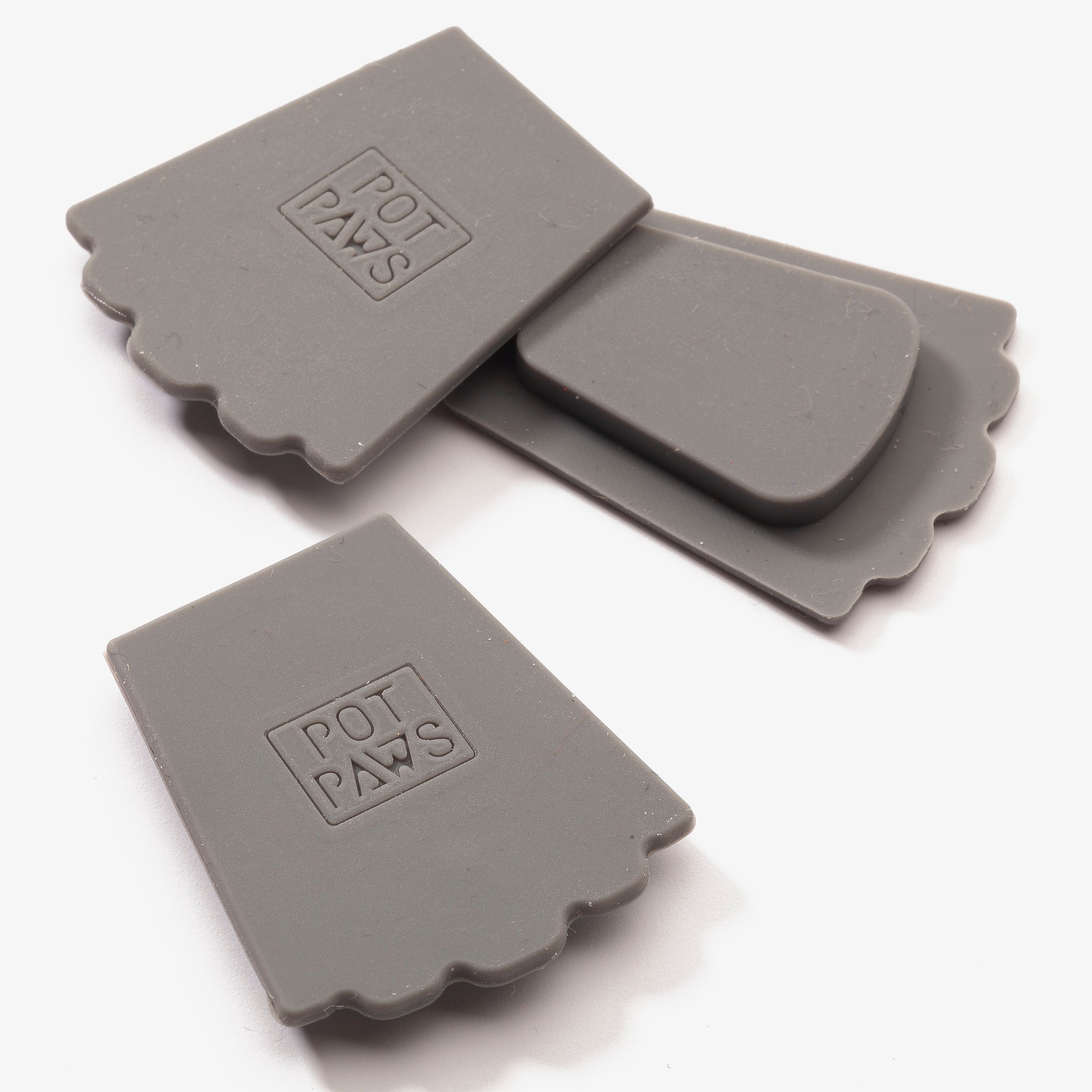 Gray silicone pet bowl mats with POT PAWS logo